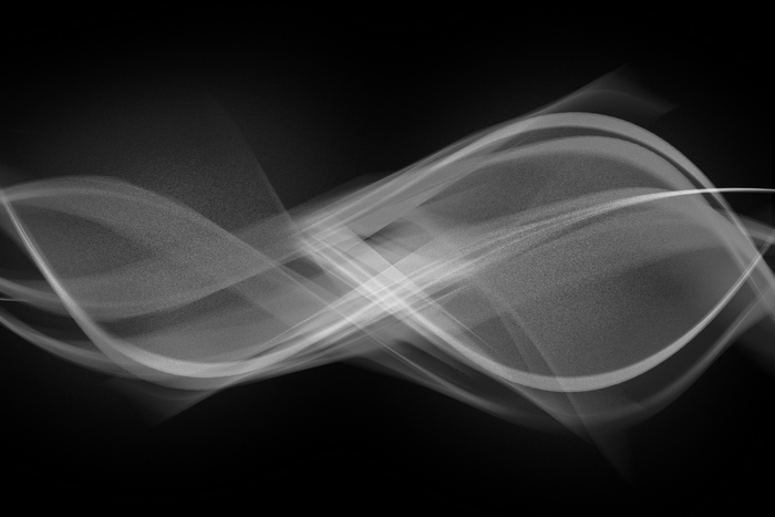 Abstract white smoke lines on black background