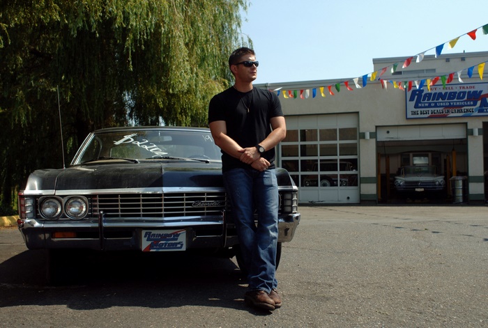 Dean Winchester from Supernatural with a classic car