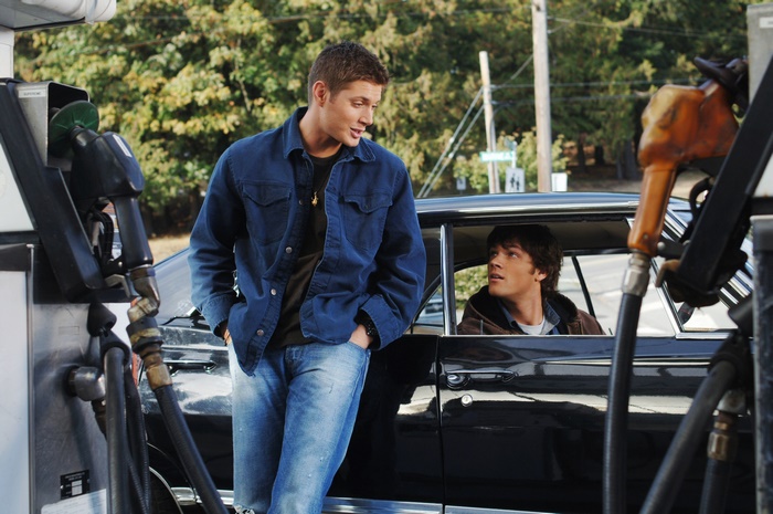 Dean and Sam Winchester from Supernatural at a gas station