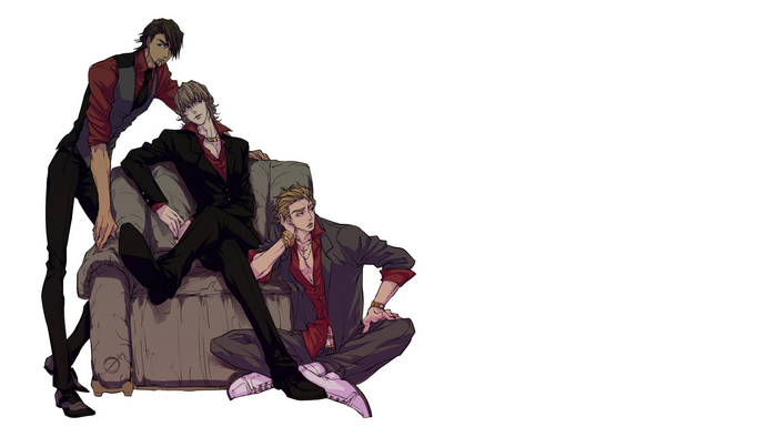 Three men in suits on a couch
