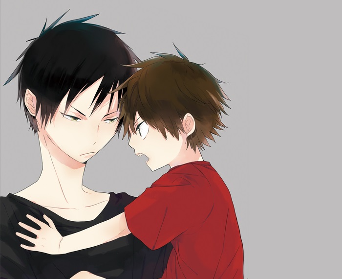 Two boys, one with black hair and one with brown hair