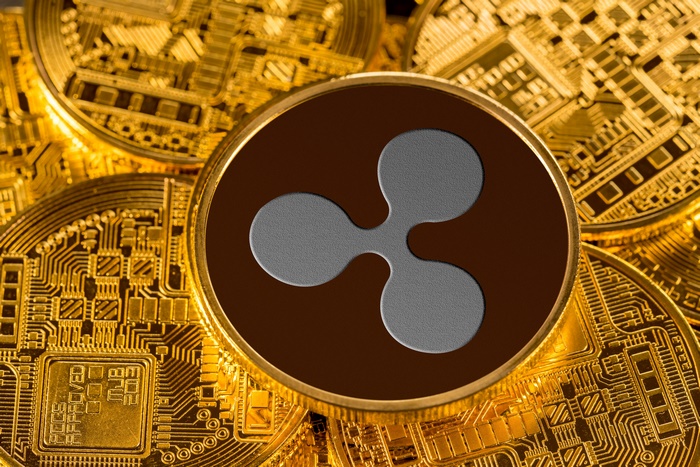 Ripple Cryptocurrency Coin on Gold Bitcoins