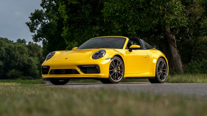 Yellow Porsche 911 Targa 4S parked on a road