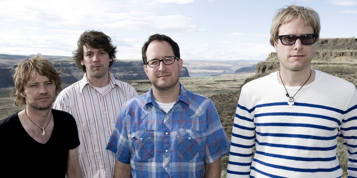 The Hold Steady band members in a landscape