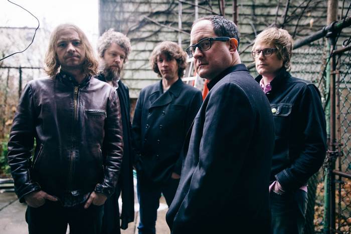The Hold Steady band members posing outdoors