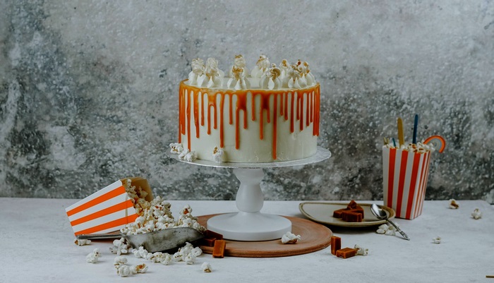 Caramel Drip Cake with Popcorn and Caramel Candies