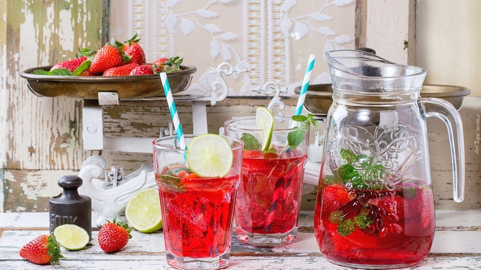 Strawberry and Lime Drink in Pitcher and Glasses