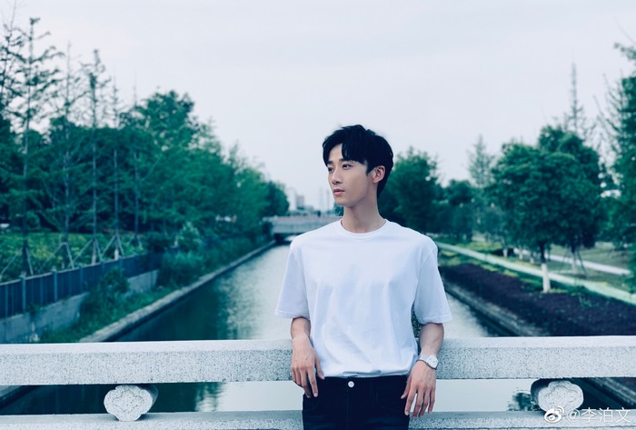 Li Bo-Wen on a bridge