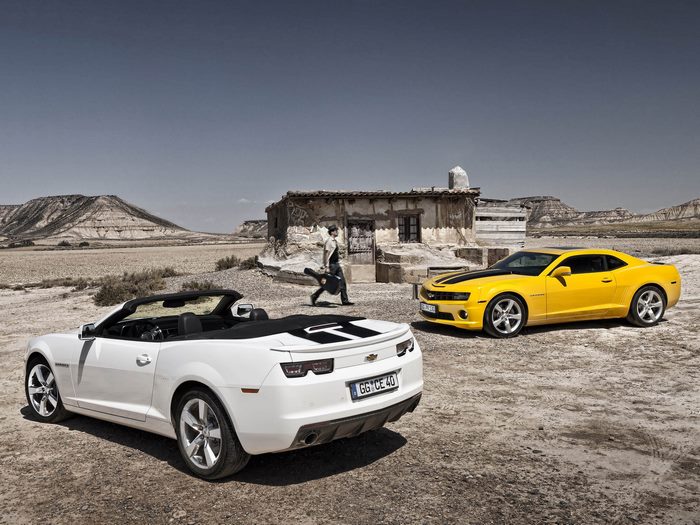 Chevrolet Camaros in a desert landscape