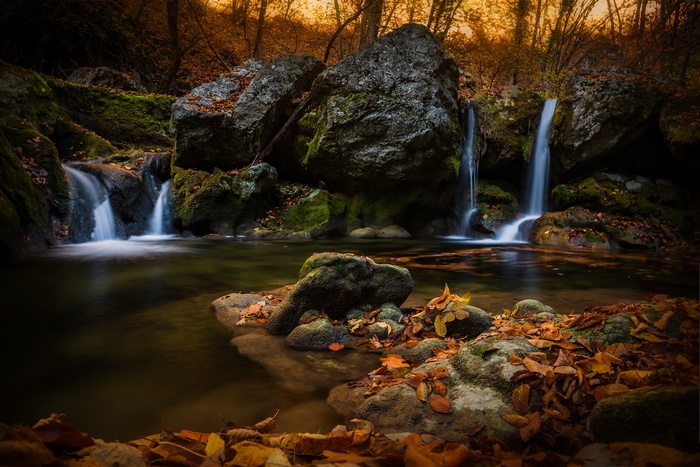 Autumn waterfall in a forest
