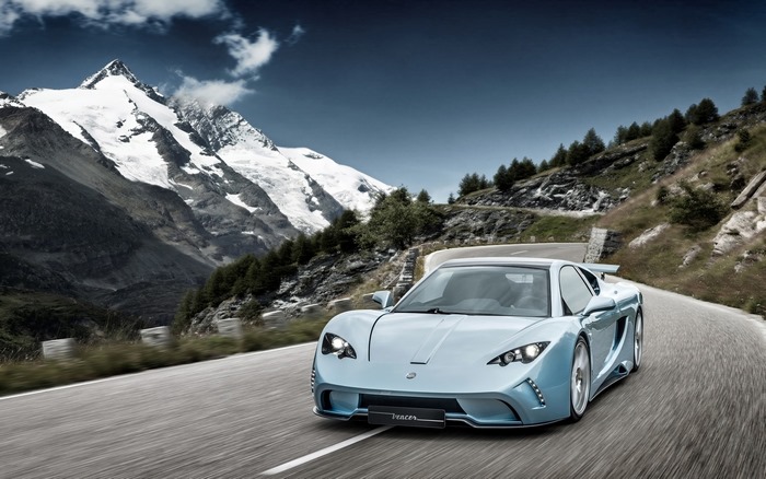 Vencer Sarthe sportscar driving on mountain road