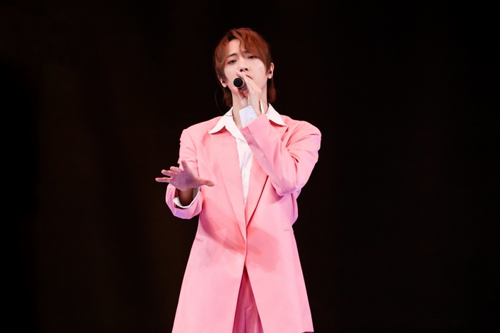 Paul Yu performing on stage