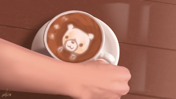 Hand holding a coffee cup with bear latte art
