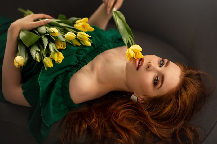 Redhead Woman with Yellow Tulips in Green Dress