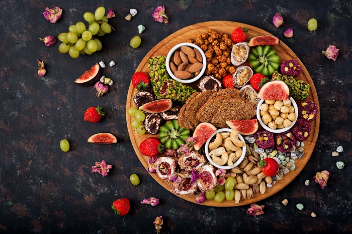 Still Life 4K with Nuts, Berries, and Fruits