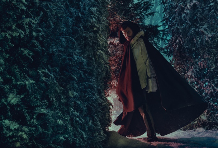 Jamie Dornan in a dark forest