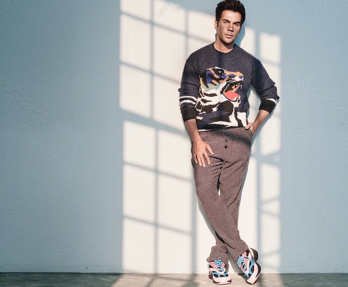 Man wearing a tiger sweater and pants