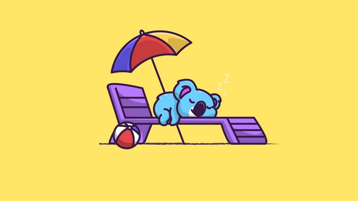 Blue koala sleeping on a deck chair under an umbrella