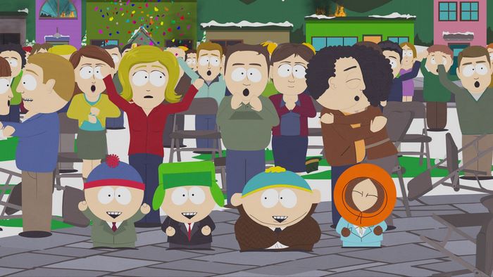 South Park characters Stan, Kyle, Cartman, and Kenny at an event