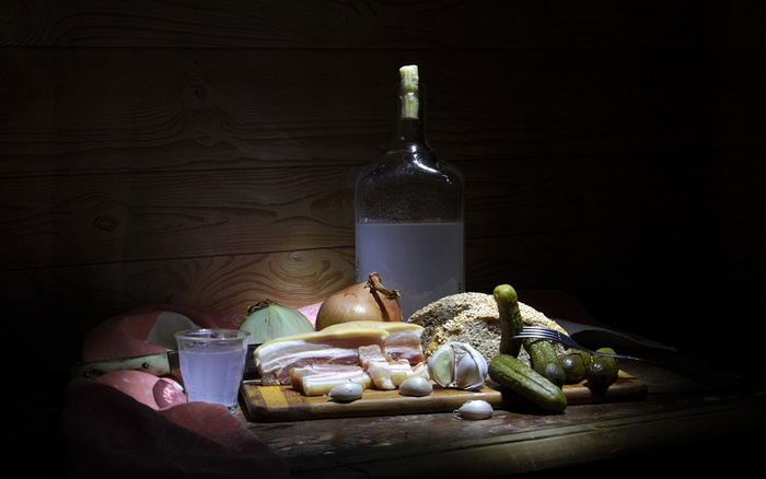 Still life with vodka, bacon, and pickles