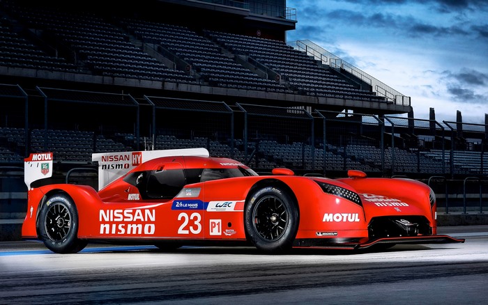 Red Nissan GT-R LM Nismo race car with number 23