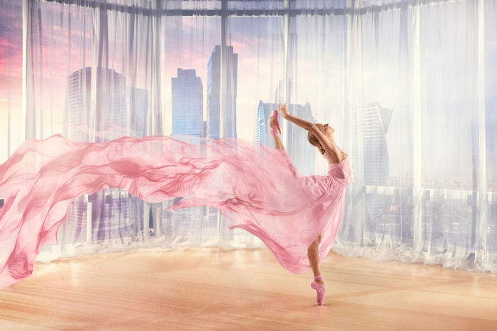 Graceful Ballet Dancer in Flowing Pink Dress 4K