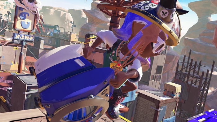 Splatoon 3 character with blue and white weapon