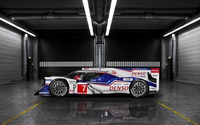 Toyota TS040 Hybrid race car with DENSO and TOTAL branding