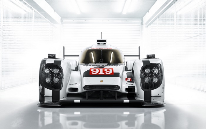 Porsche 919 Hybrid race car in a garage