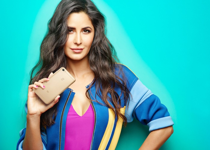 Katrina Kaif holding a smartphone
