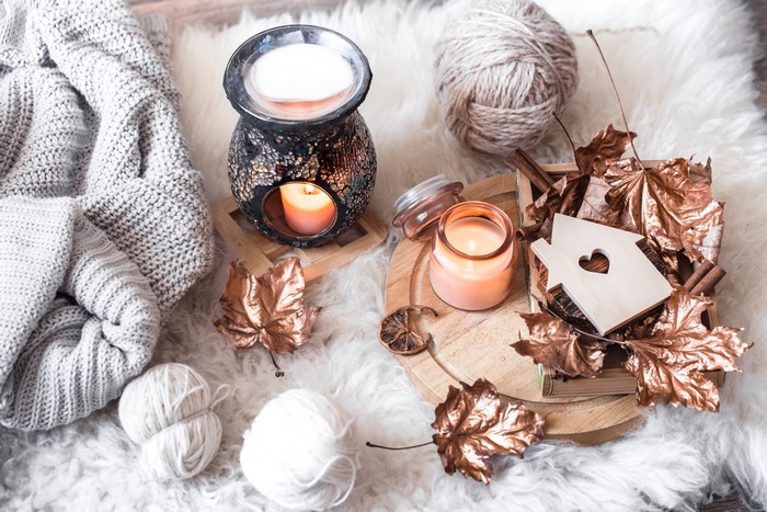 Cozy Autumn Still Life with Candles and Yarn