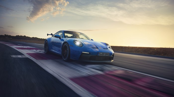 Blue Porsche 911 GT3 on a Racetrack