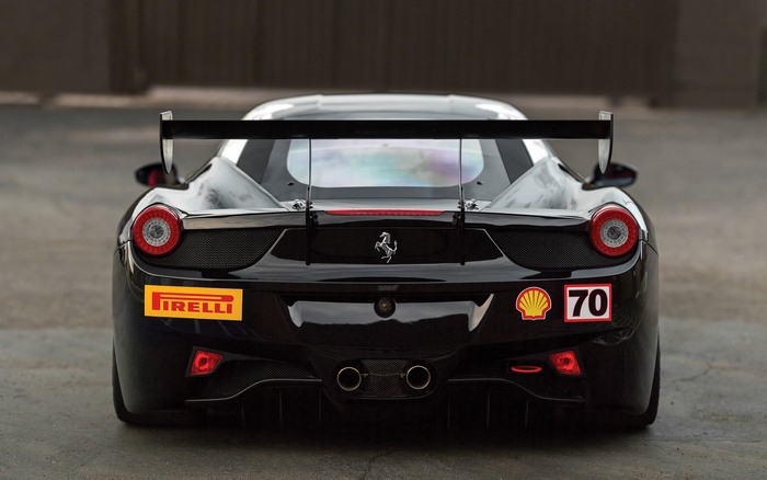 Black Ferrari 458 Challenge Evoluzione with racing decals