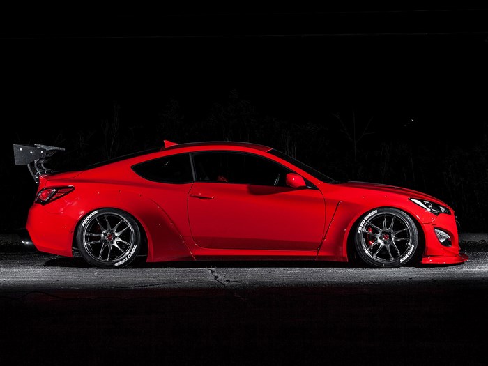 Red Hyundai Genesis Coupe with large spoiler
