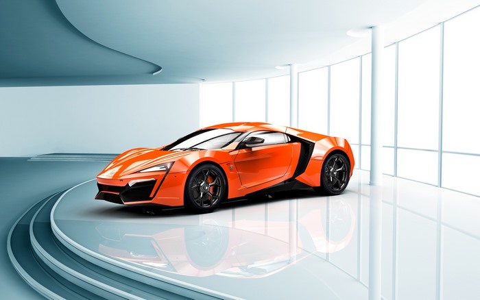 Orange Lykan Hypersport sports car in a showroom