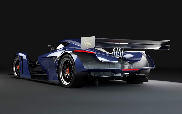 Blue Praga R1 race car with large rear wing