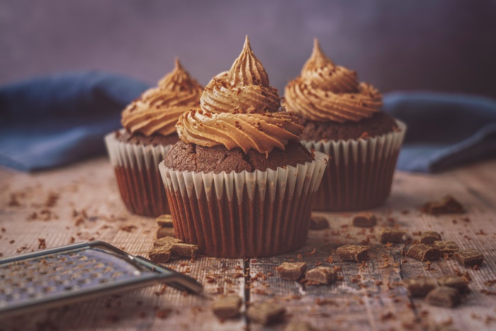 Chocolate cupcakes with cream frosting