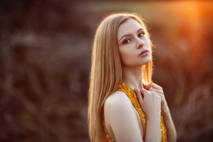 Blonde Woman with Long Hair in Soft Light
