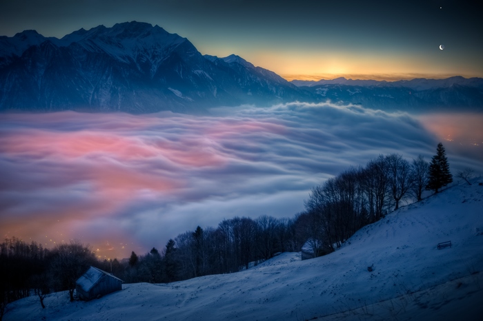 Low Clouds over Swiss Mountains at Dusk