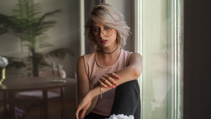 Blonde Woman with Glasses and Short Hair