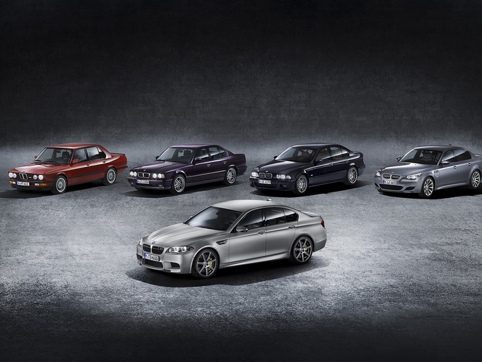 BMW M5 Generations: Red, Purple, Blue, and Gray Sedans