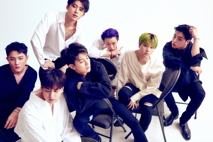 iKON members posing for a photoshoot