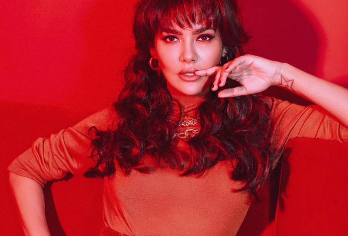 Esha Gupta posing with hand on lips