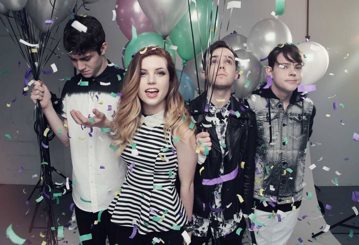 Echosmith band members with balloons and confetti