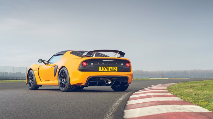 Orange Lotus Exige Sport 390 4K on a Racetrack