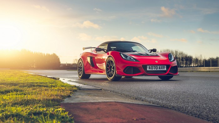 Red Lotus Exige Sport 420 on a race track