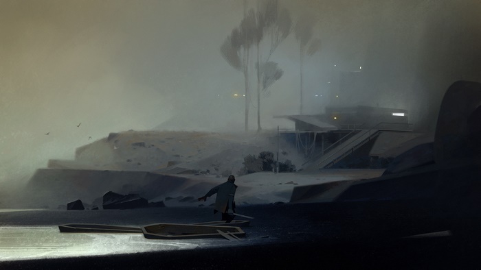 Man in a coat near boats in a foggy landscape