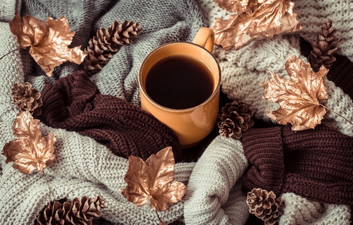 Coffee cup with autumn decorations