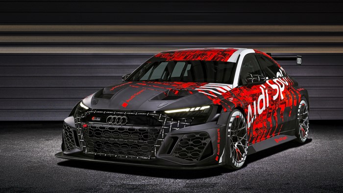 Audi RS3 LMS race car with red and black livery