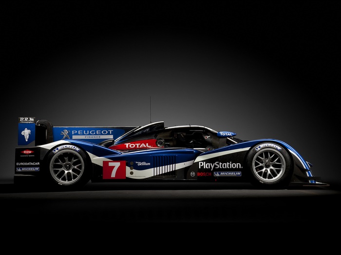 Peugeot 908 race car with PlayStation and Total sponsorship